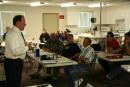 Divers and surface support personnel learning how to properly process an underwater crime scene